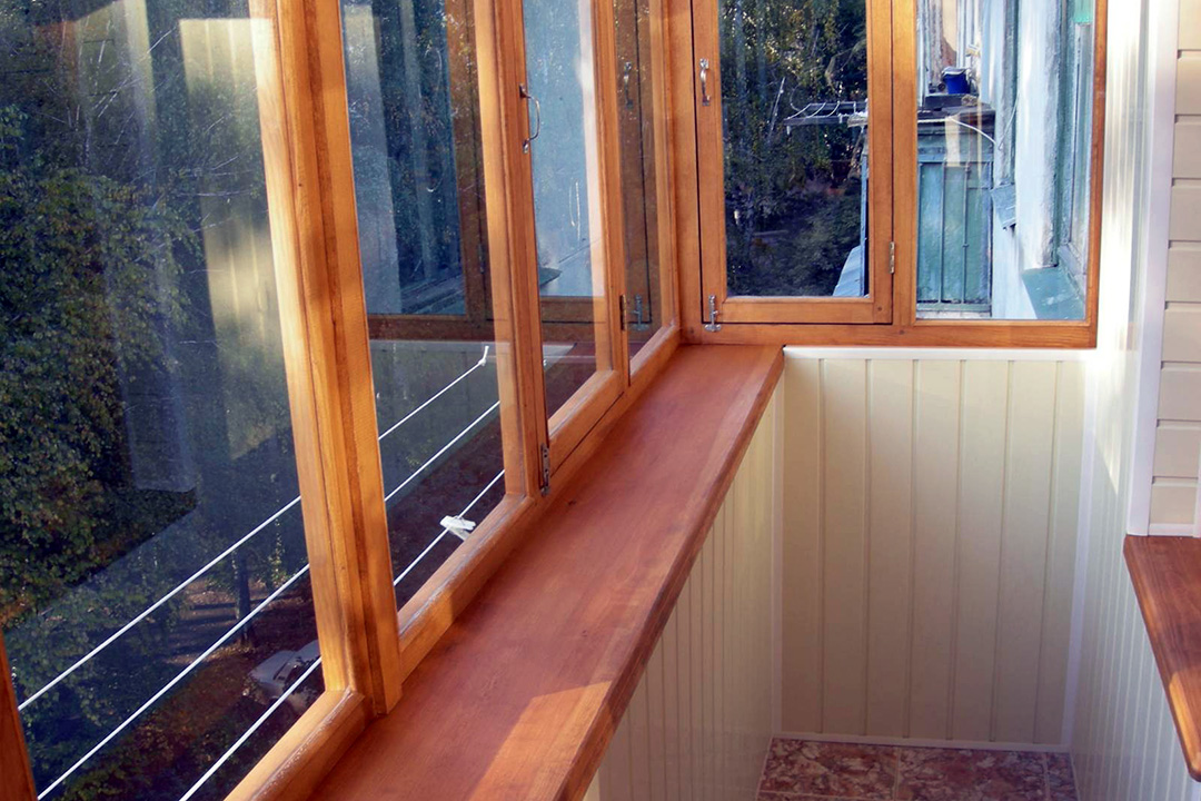 Тип остекления балкона: деревянные рамы